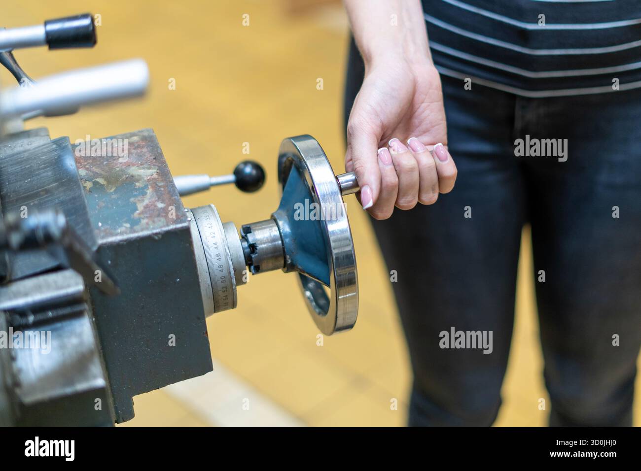 Old worn out milling machine control panel and control dial in a workshop Stock Photo