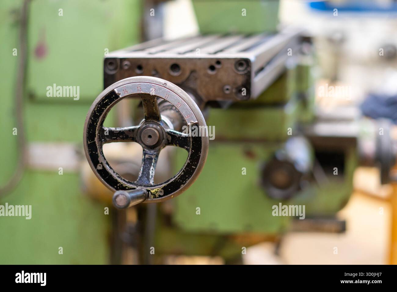 Old worn out milling machine control panel and control dial in a workshop Stock Photo