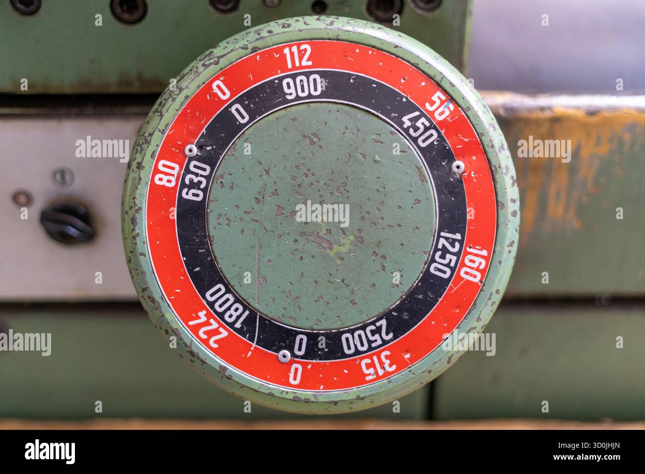 Old worn out milling machine control panel and control dial in a workshop Stock Photo