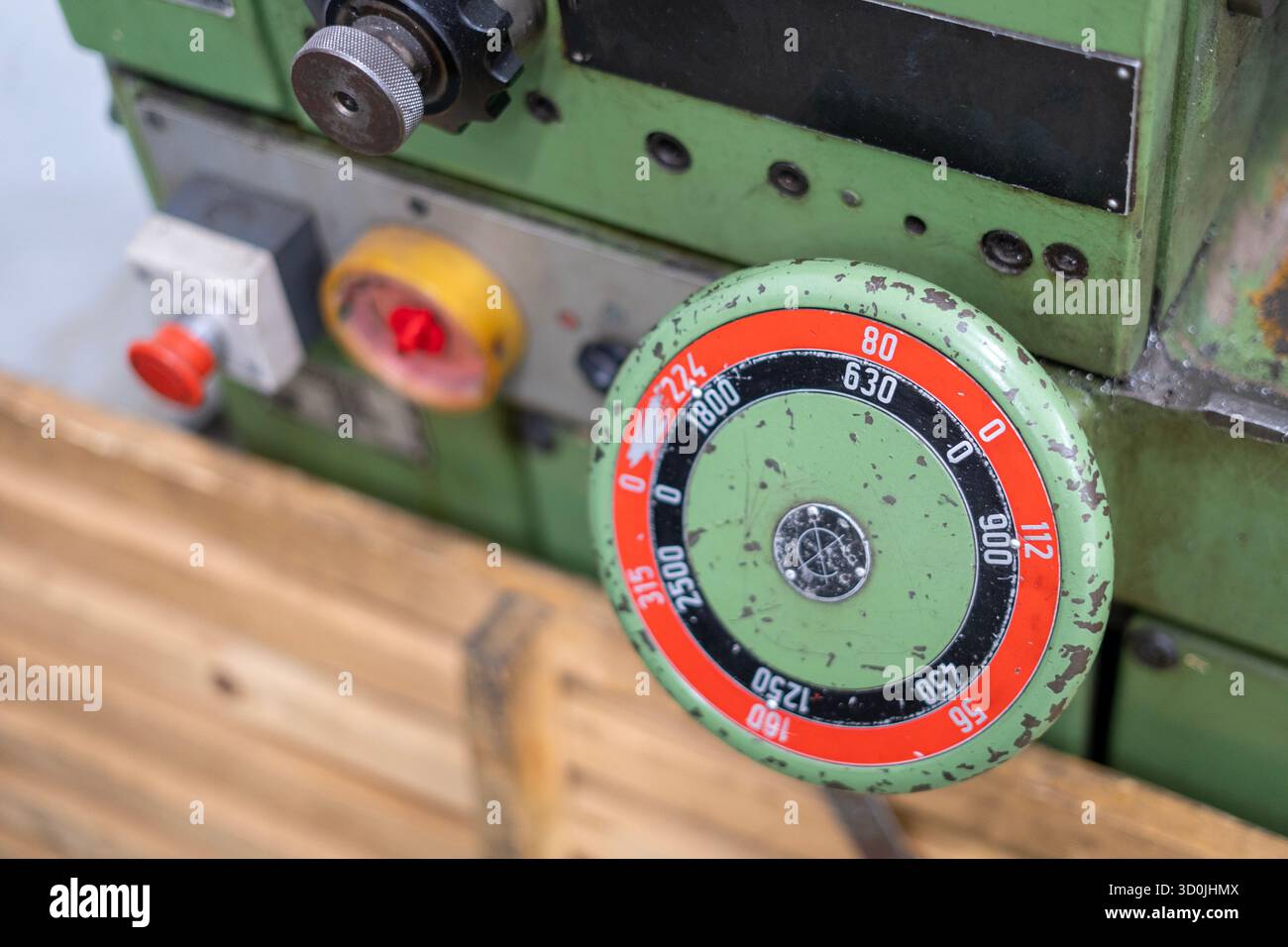 Old worn out milling machine control panel and control dial in a workshop Stock Photo