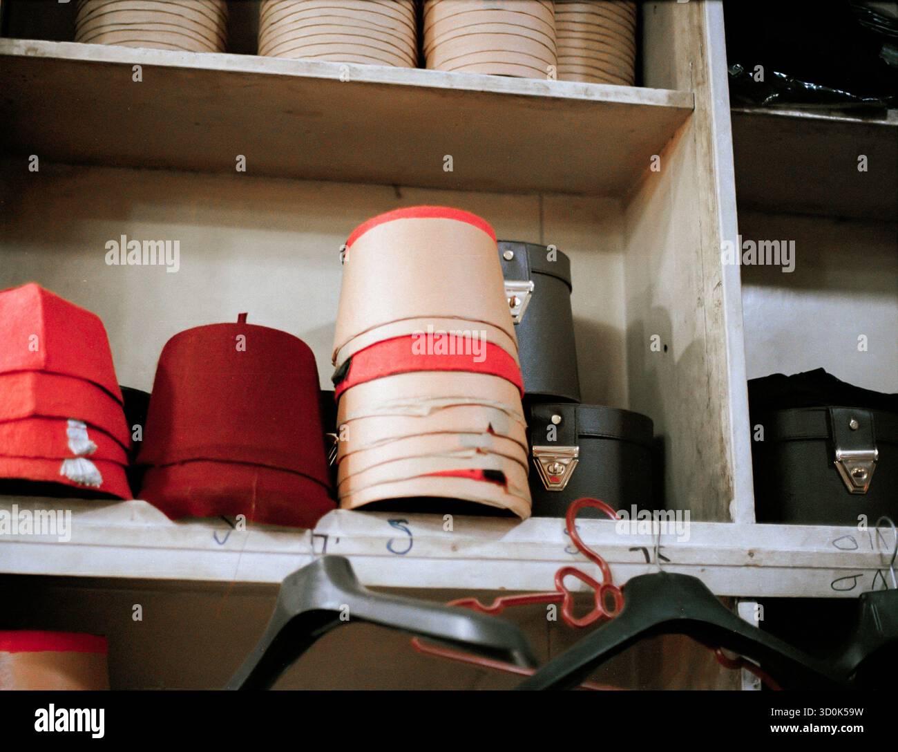 Traditional tarbush fez hat in various stages of completion at the last traditional workshop in Cairo, Egypt Stock Photo