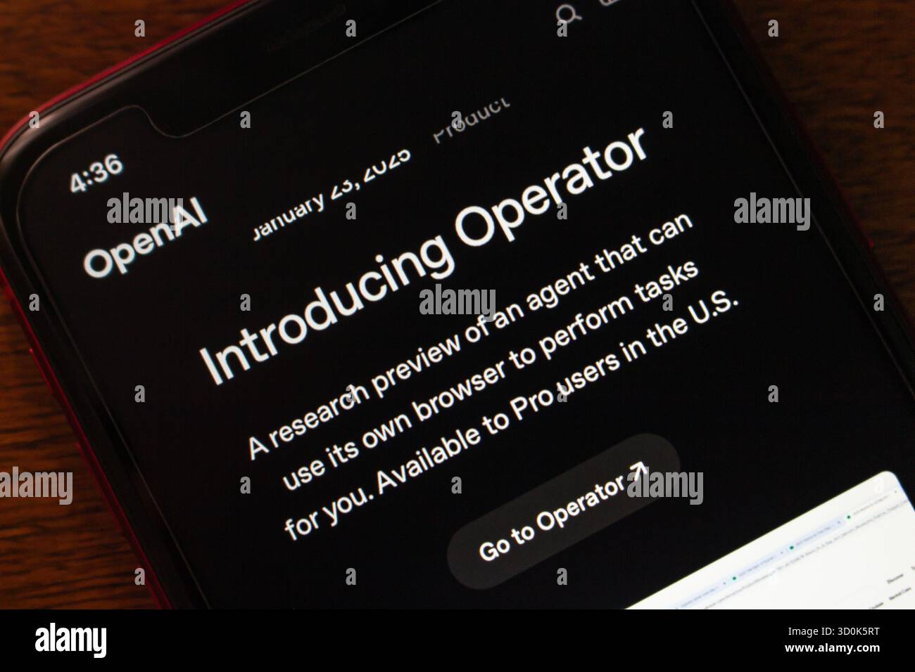 Smartphone displaying OpenAI's Operator launch page, introducing a browser-capable AI agent for task automation and research preview. Stock Photo