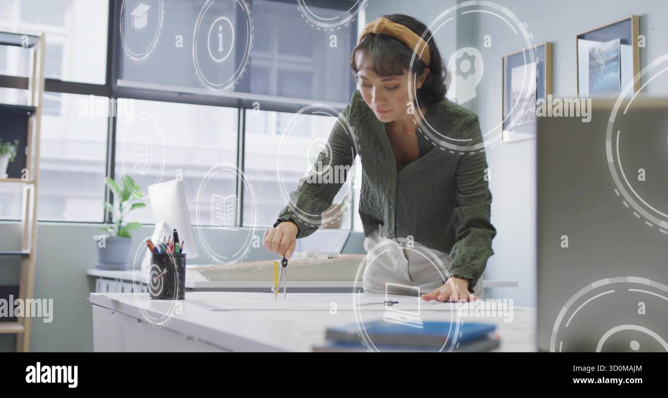 Leaning architect drawing precise arcs on drafting table in office, with compass and blueprints Stock Photo