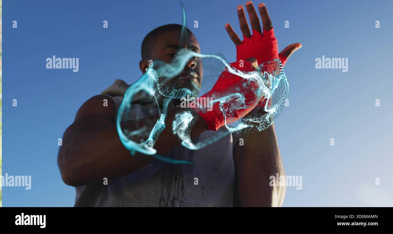 African American athlete wrapping hands under blue sky with red wraps swirling light-blue particles Stock Photo