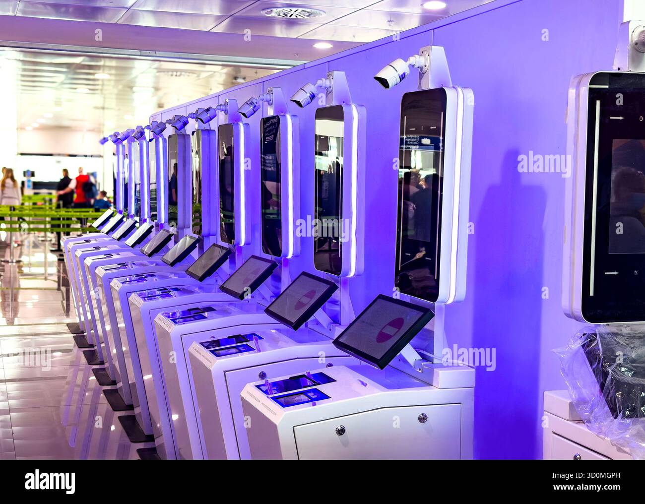 Row of modern self-service EES immigration kiosks with digital touchscreens and biometric scanners in an airport terminal palma mallorca spain - Smartphone Captured Stock Image Row of modern self-service EES immigration kiosks with digital touchscreens and biometric scanners in an airport terminal palma mallorca spain - Smartphone Captured Stock Image