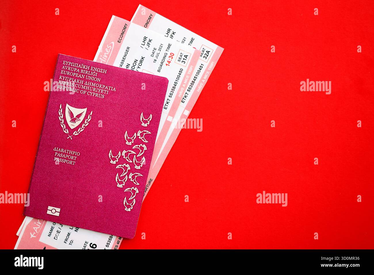 Kyprus passport and commercial airlines boarding pass tickets close up. Travel flights and avia tourism in Europe concept Stock Photo