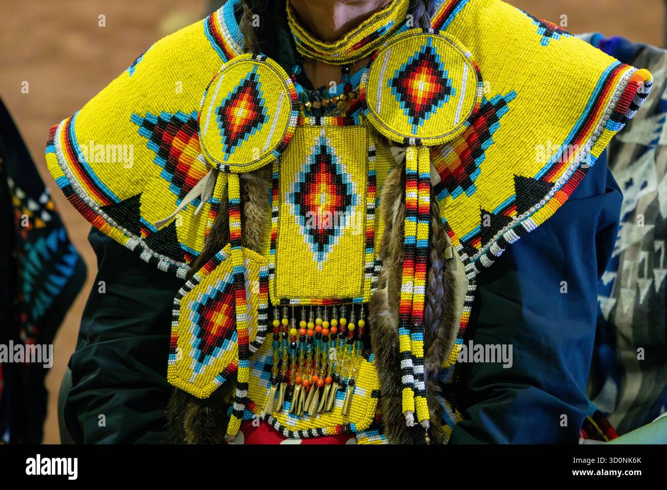 Detail of beaded dance regalia of a woman dancer at a Native American ...