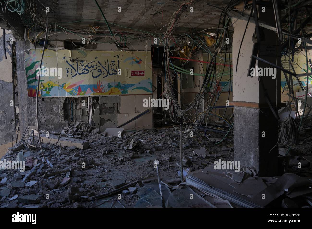 Written in Arabic, a welcome message decorates the wall of a section of ...