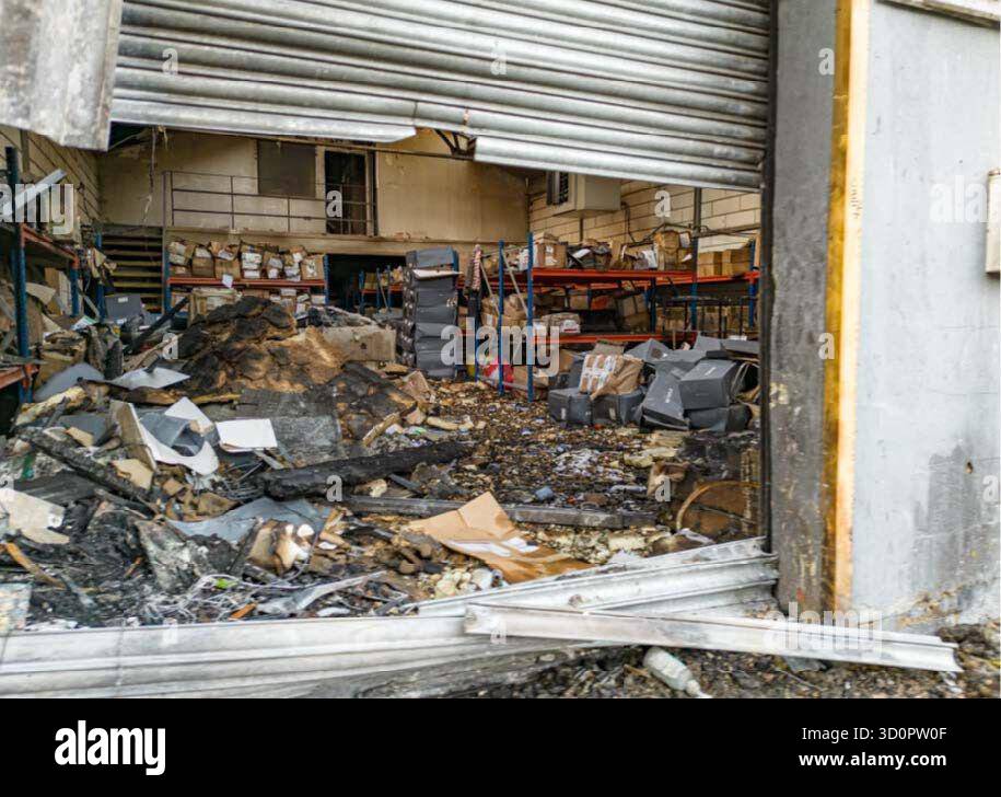 Undated handout photo issued by the Metropolitan Police of the damage to an east London warehouse. A group of Wagner Group stooges have been jailed for setting fire to a warehouse storing aid to Ukraine, as part of a planned "campaign of terrorism and sabotage" for the Russian state. Dylan Earl was jailed for 17 years and fellow organiser Jake Reeves for 12 years, both admitted charges against them, making them the first to be convicted of offences under the National Security Act 2023. Jakeem Rose was jailed for eight years and 10 months, Nii Mensah for nine years, and homeless Ugnius Asmena,  Stock Photo
