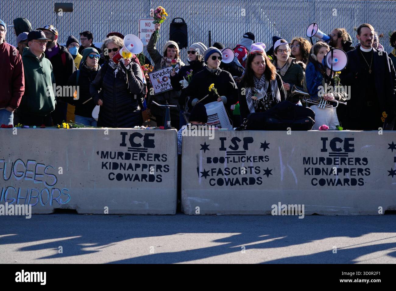 Protesters gather outside an ICE processing facility in Broadview, Ill ...
