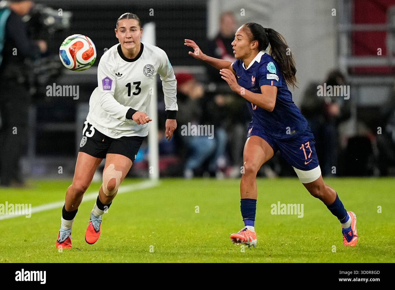 Germany's Carlotta Wamser, left, and France's Selma Bacha run for the ...