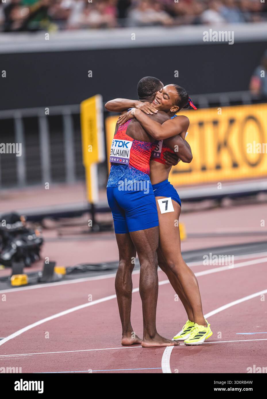 Jasmine Jones and Rai Benjamin hugging each other in the World ...