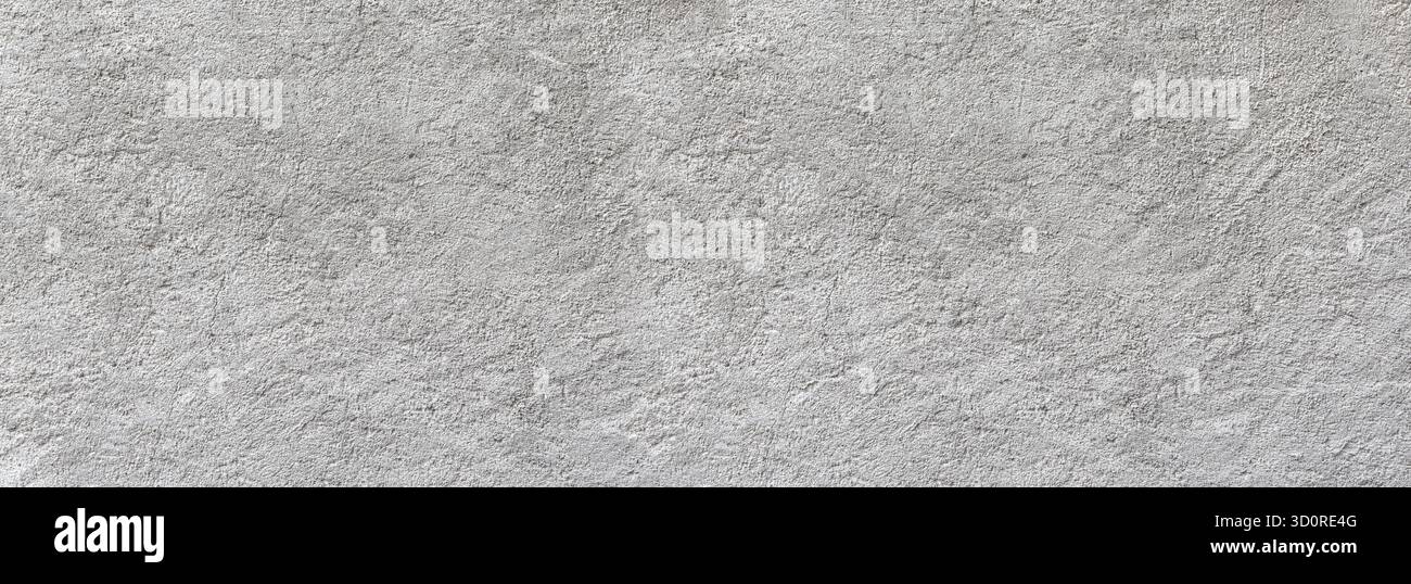 Rough gray concrete wall texture providing an abstract background Stock Photo