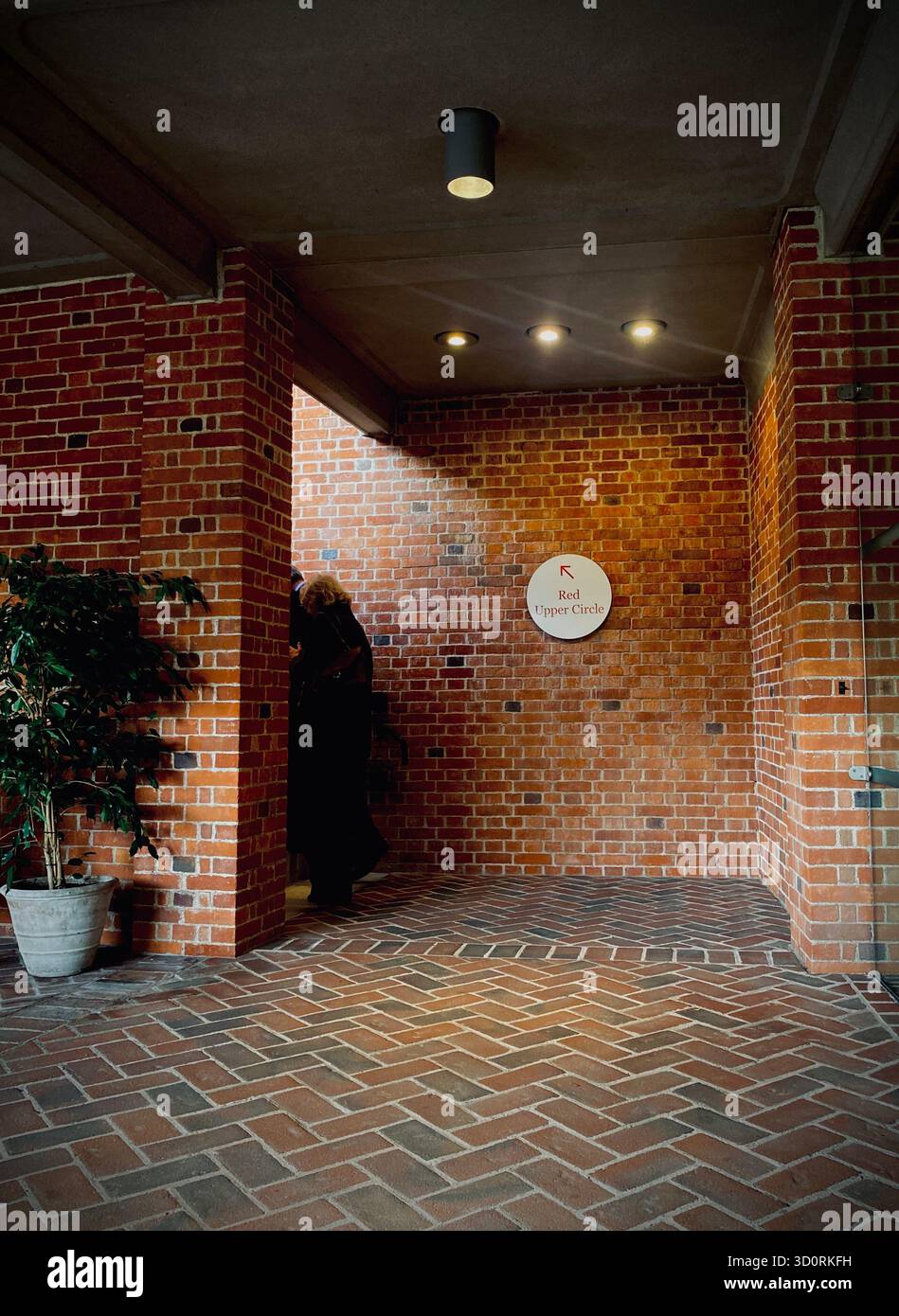 Glyndebourne Sussex Oct 2025 blurred people walking up a staircase to the upper circle - Smartphone Captured Stock Image