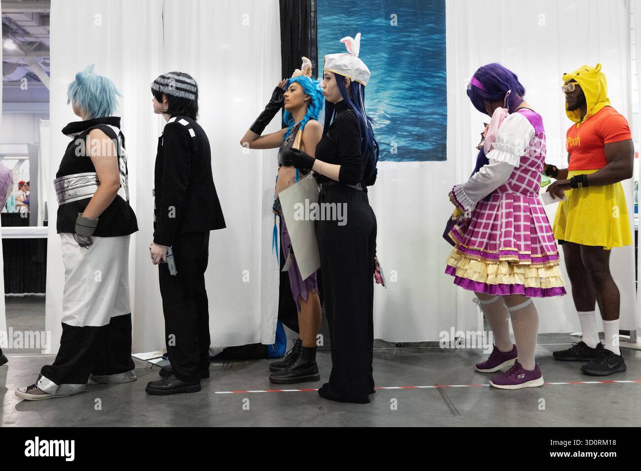 People in Colorful Cosplay Costumes Lining Up at Fan Expo Boston Stock Photo