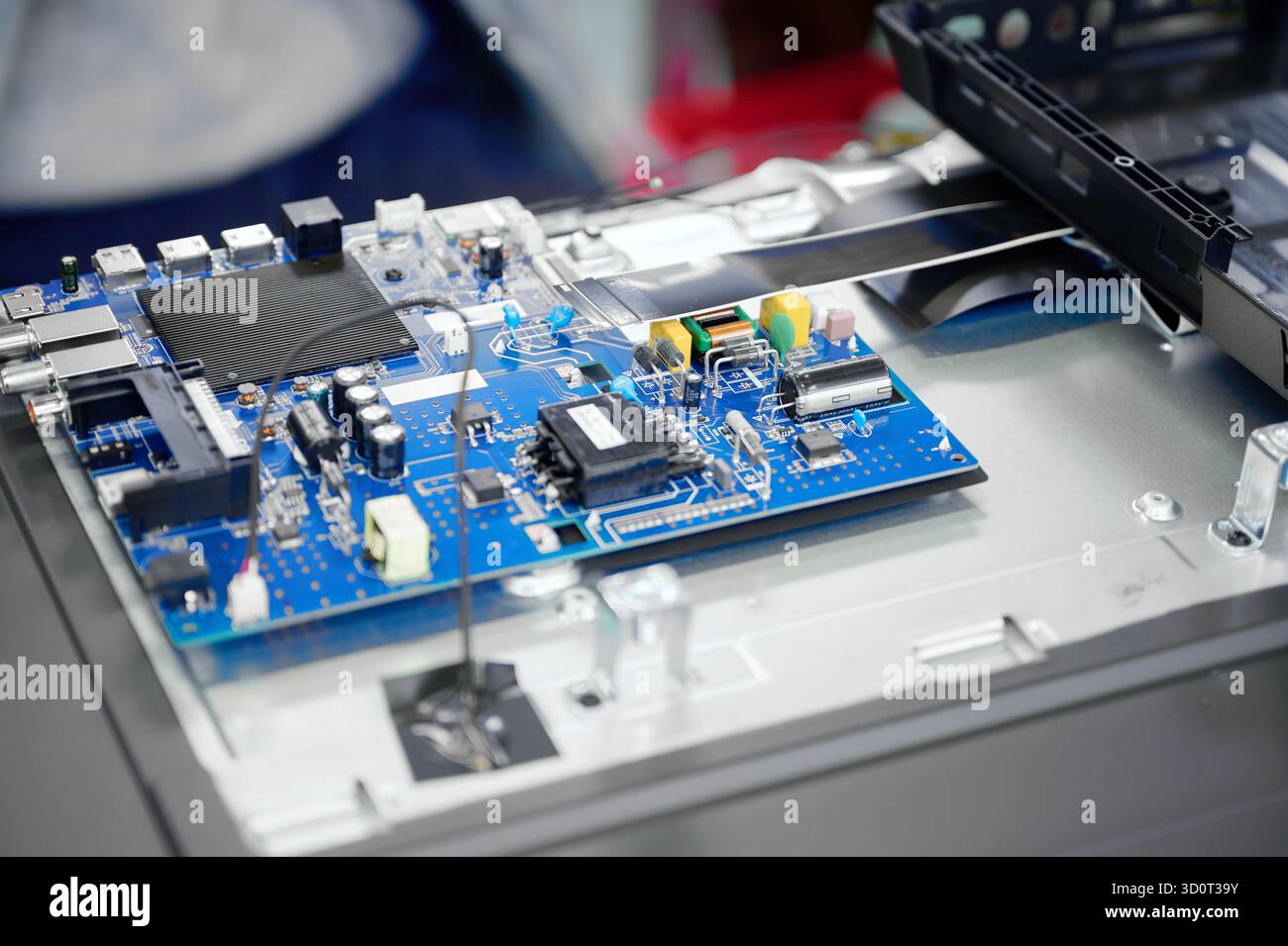 Electronics repair assembly workers hi-res stock photography and images ...