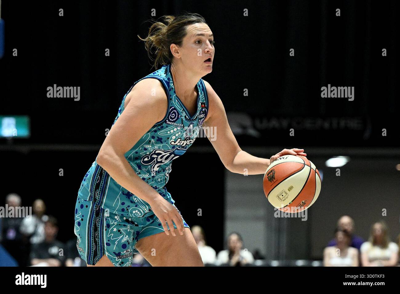 Haley Peters of the Flyers controls the ball during the WNBL Round 2 ...