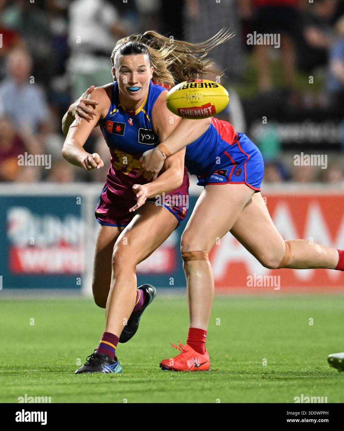 Jennifer Dunne (left) of the Lions in action during the AFLW Round 11 ...