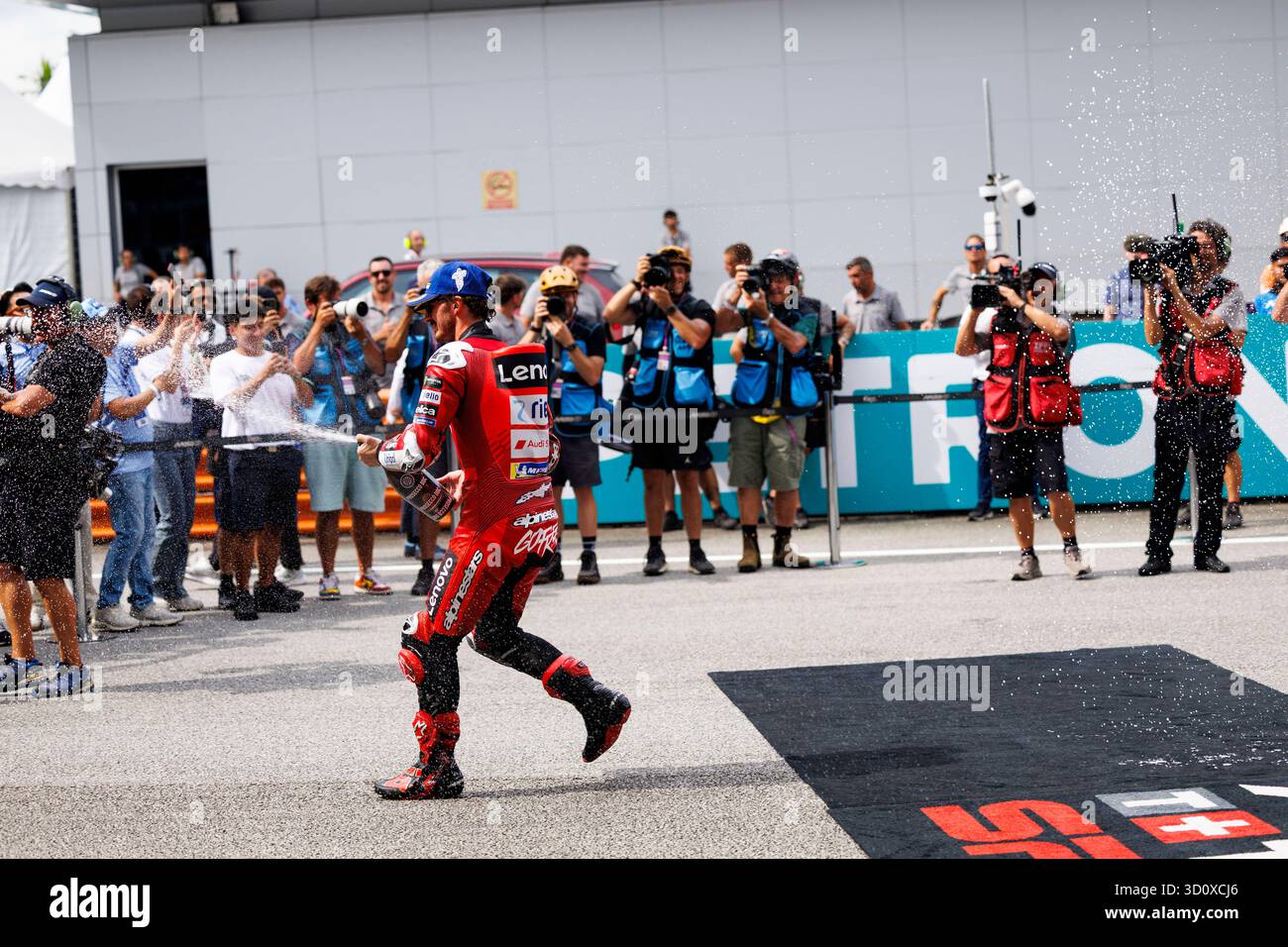 Number 63 Ducati Lenovo Team rider Francesco Bagnaia celebrates winning ...