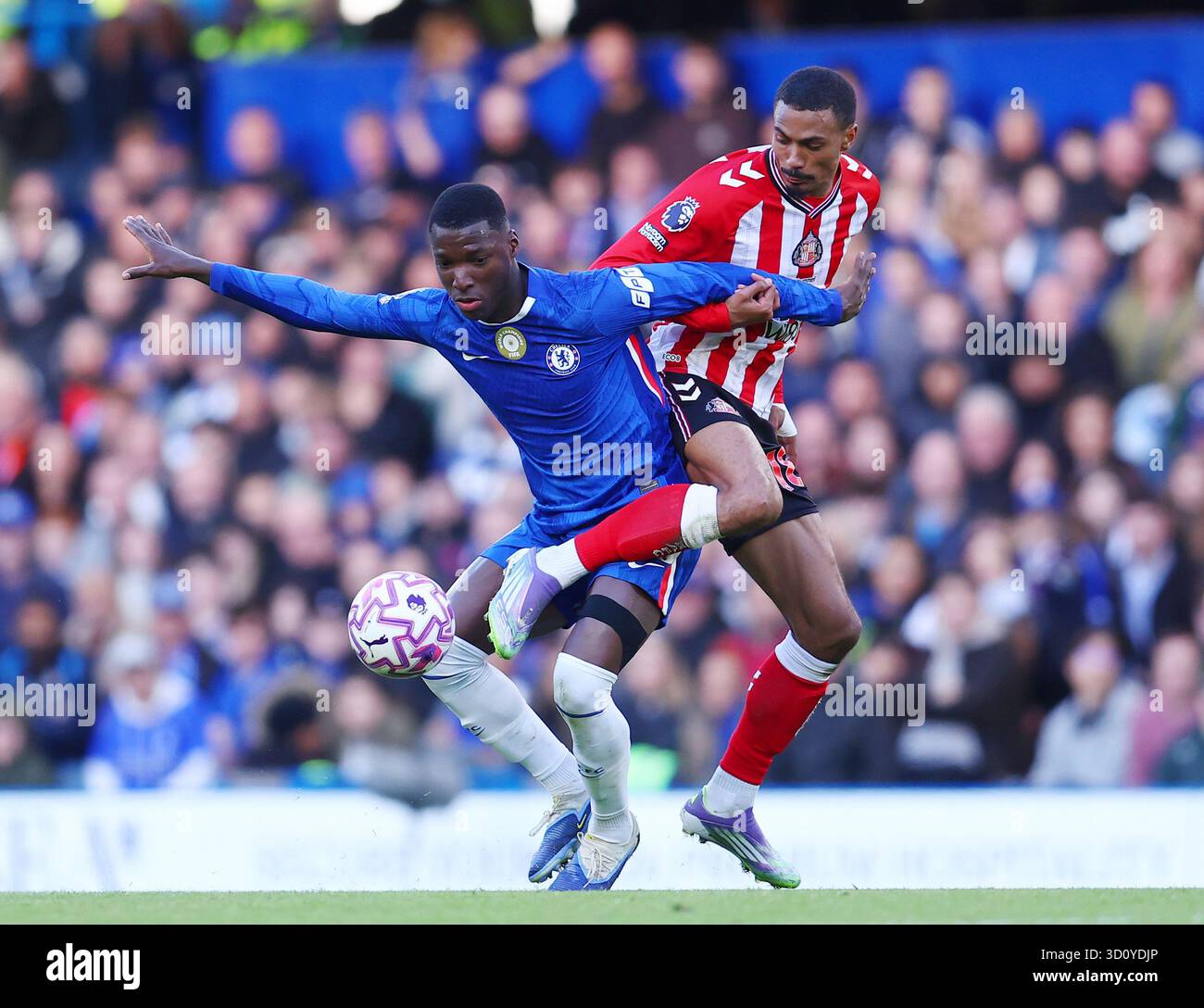 London, England, 25th October 2025. Moises Caicedo of Chelsea tussles ...