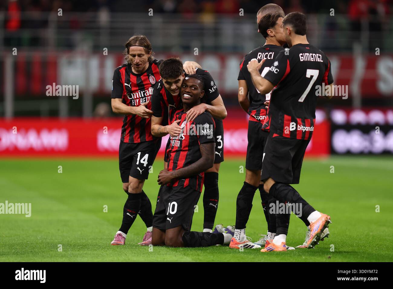 Rafael Leao of Ac Milan celebrates with his team mates after scoring a ...