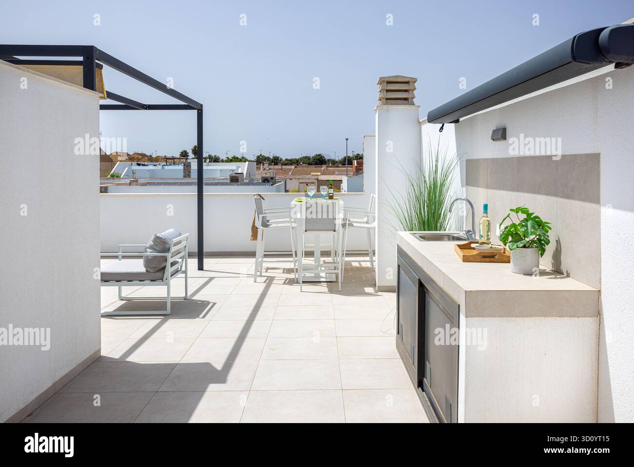 Photo inspiration: Fresh Look at View Along Rooftop Terrace Showing Built In Outdoor Kitchen Sink