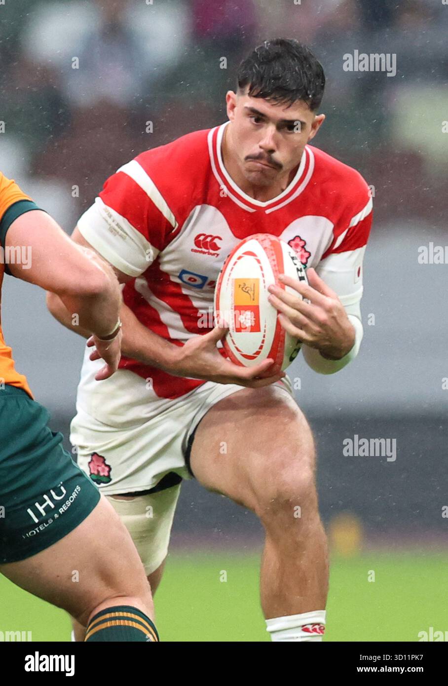 October 25, 2025, Tokyo, Japan - Japan's center Dylan Riley carries the ...