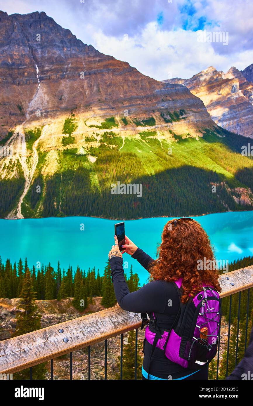 Tourist Hiker Taking Photo of Turquoise Lake and Mountains in Banff ...