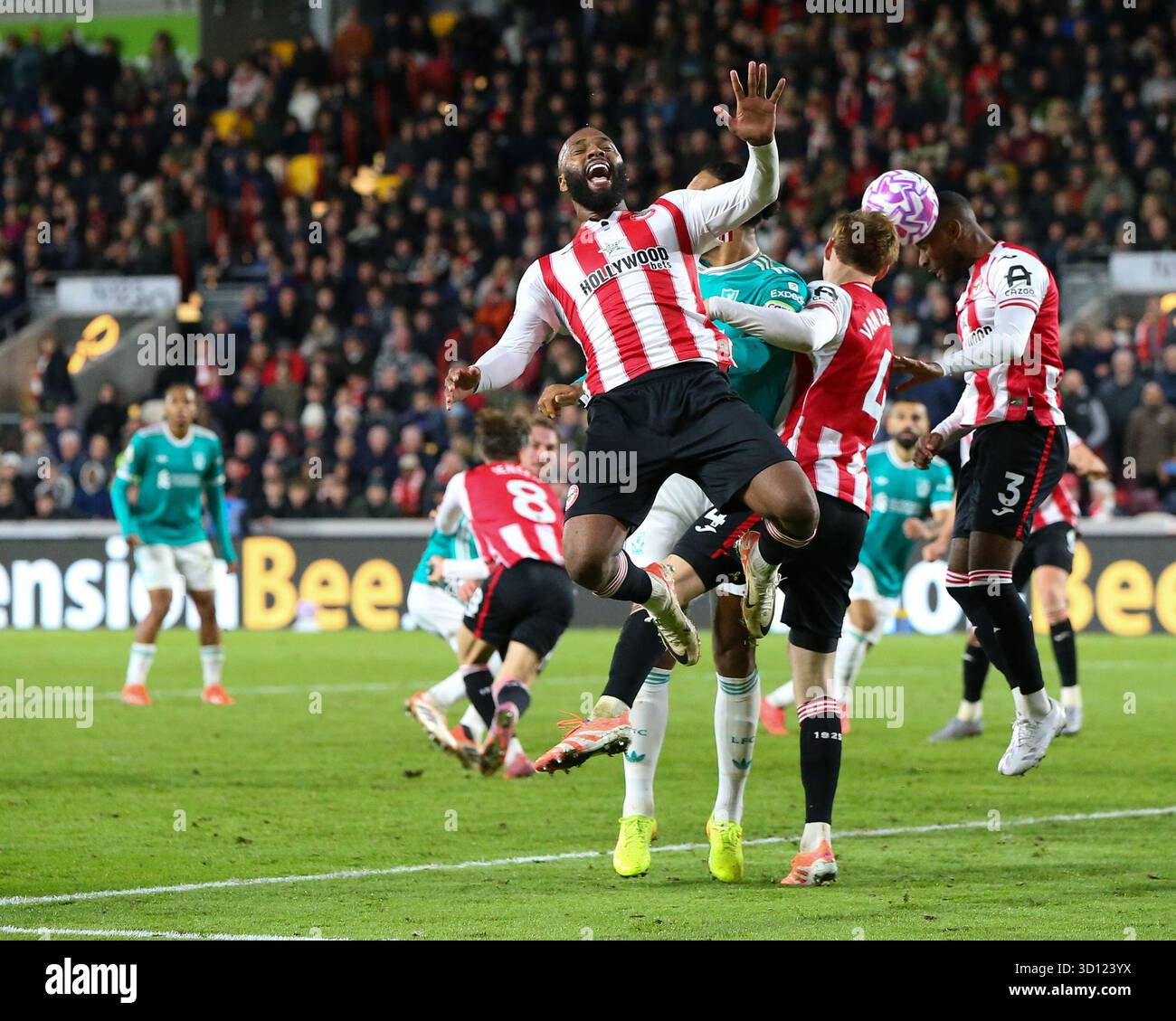 London, England, October 25 2025: Rico Henry (3 Brentford) heads clear ...
