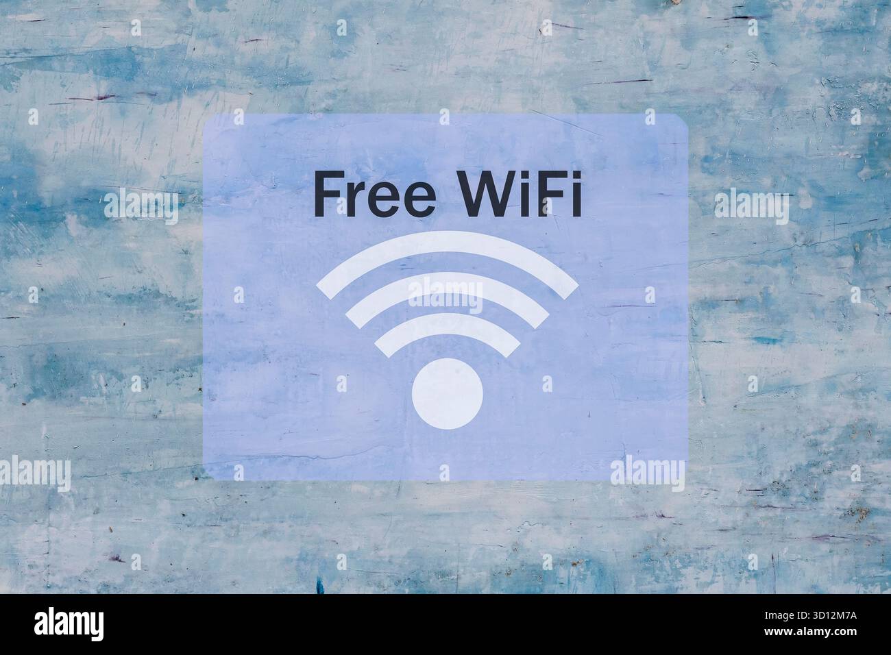 Free Wi Free Wi-Fi symbol on old blue wall background Stock Photo - Alamy