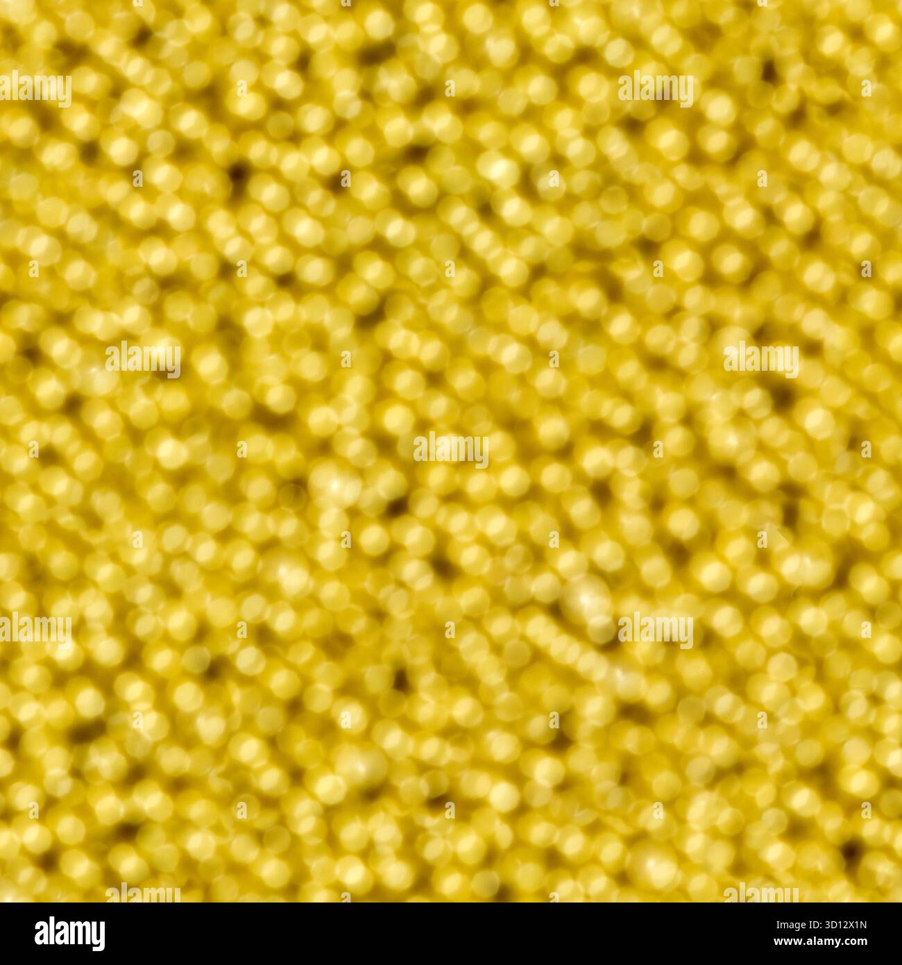 Yellow light bokeh. Seamless square texture. Stock Photo
