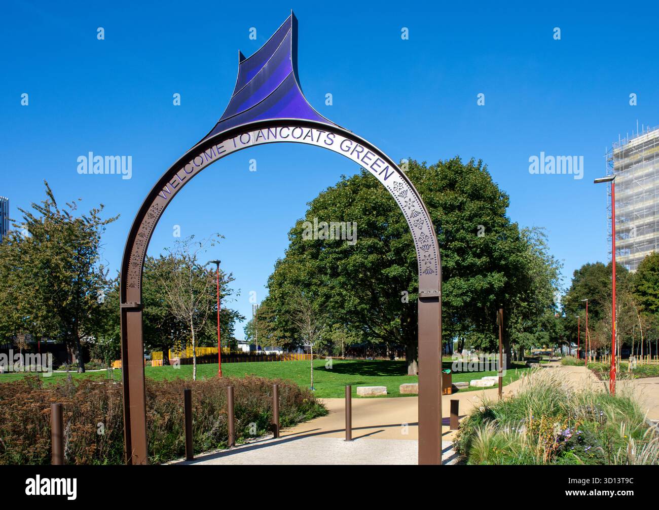 Sculptured arched sign at the entrance to Ancoats Green park, Ancoats, Manchester, England, UK. Stock Photo