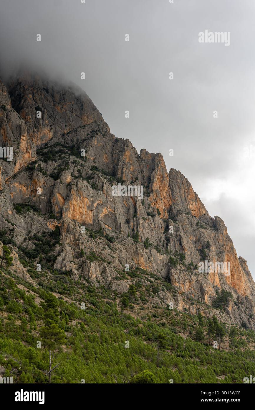 Spain Cliffs Steep rocky cliff partially shrouded hi-res stock photography and ...
