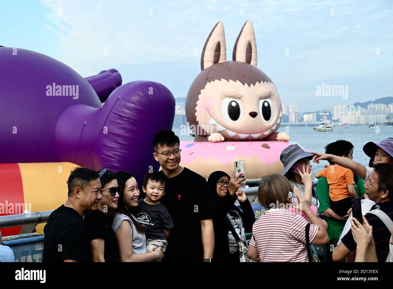 Labubu Inflatable Floating inflatable sculpture of Grimes and Labubu at the “Water Parade ...