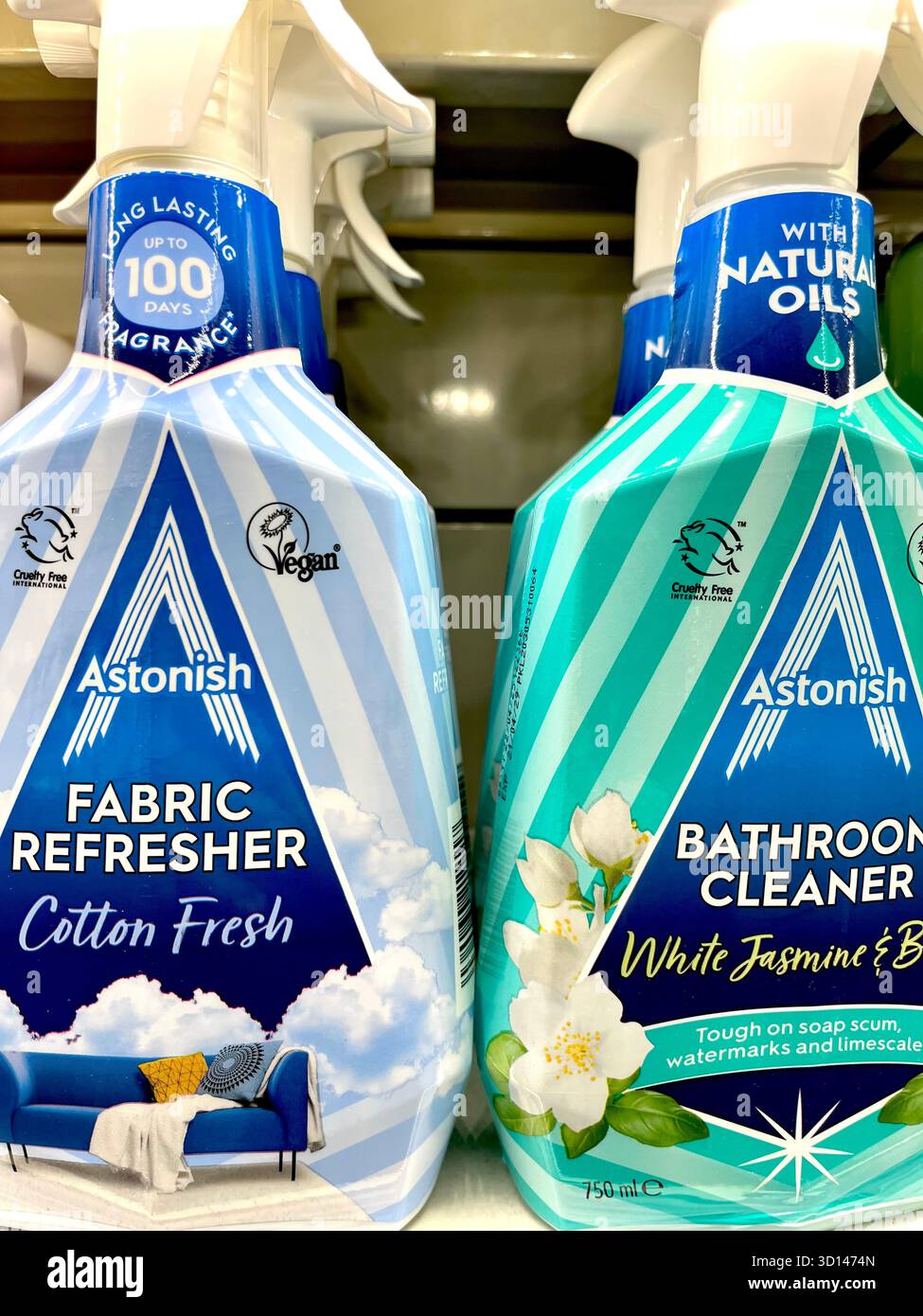 Astonish cleaning spray bottles displayed on store shelf - Smartphone Captured Stock Image