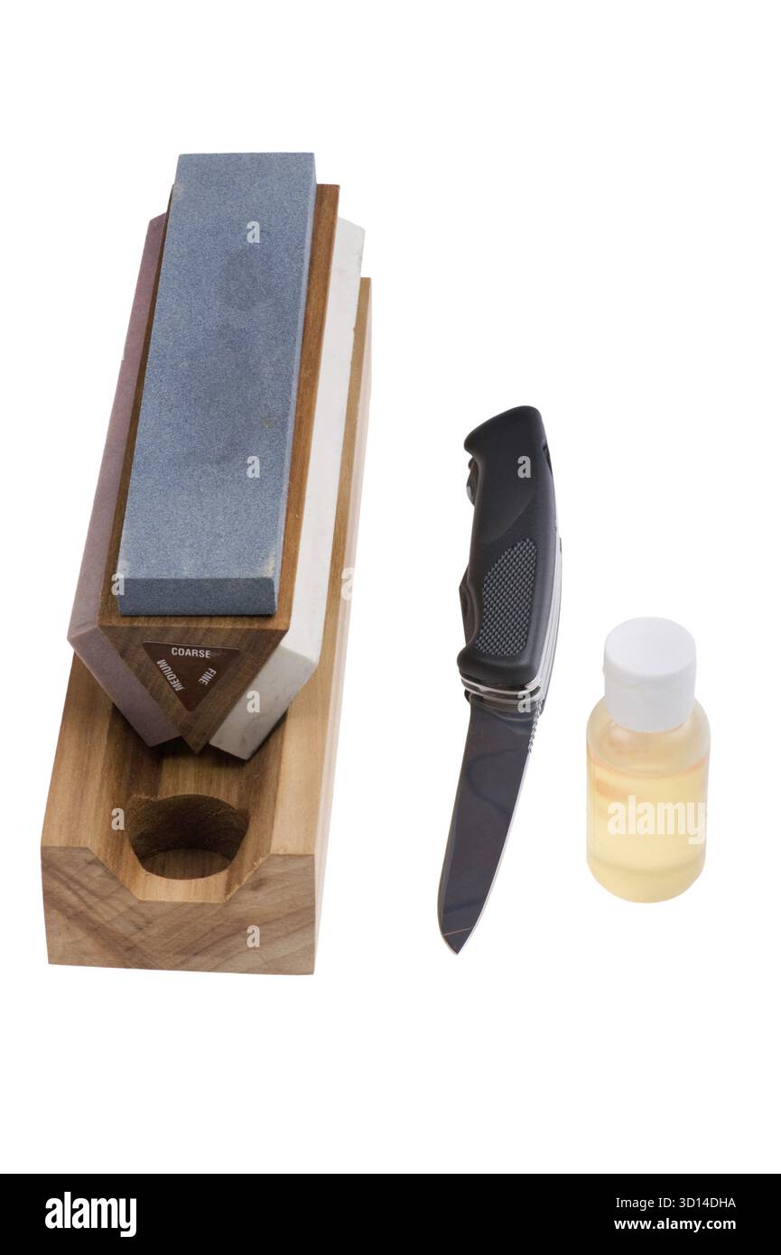 Object on white - Sharpener stone and knife Stock Photo