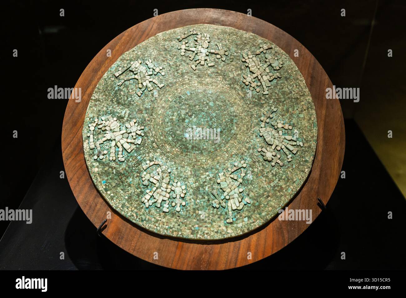 Aztec turquoise mosaic disc with seven warrior figures symbolizing ...