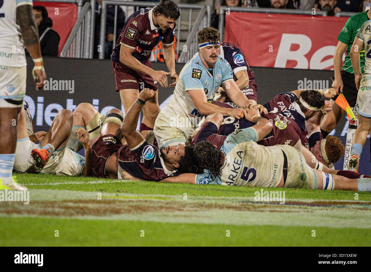The scrum advances and enters the Aviron Bayonnais try zone, with UBB ...