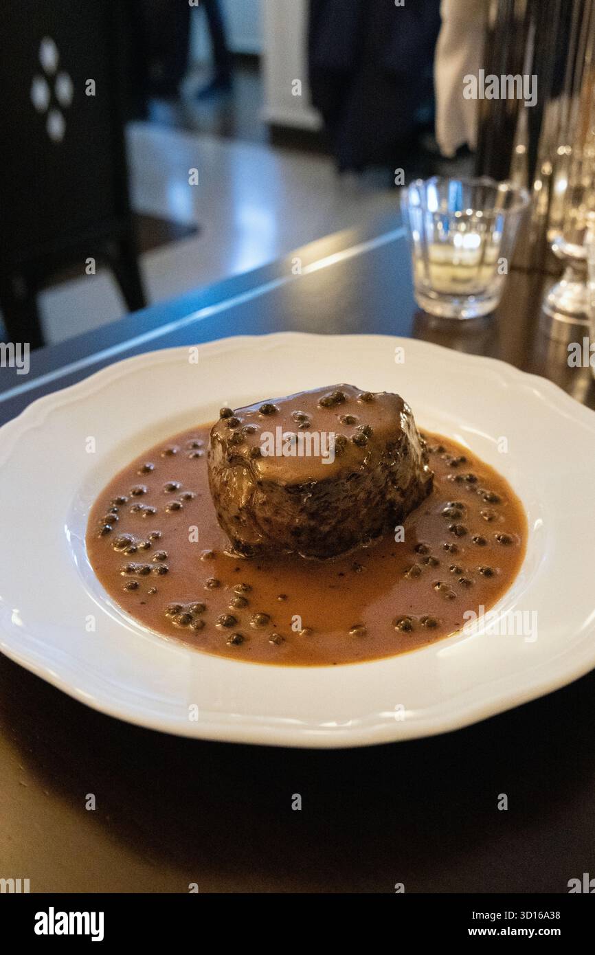 Peppercorn steak at 74 Duke restaurant, Mayfair, London, England Stock Photo