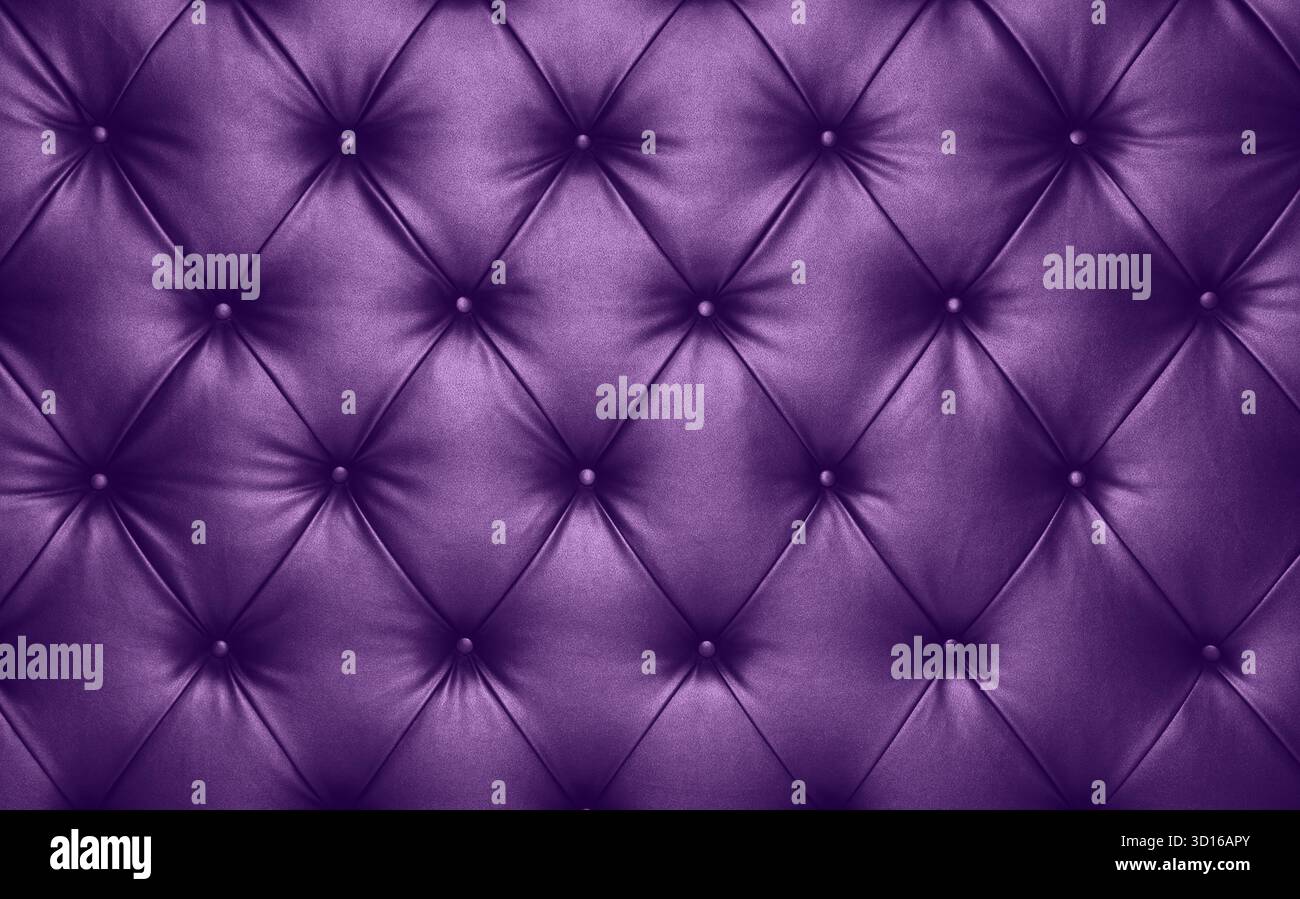 Close up background texture of violet lavender colored capitone genuine leather, retro Chesterfield style soft tufted furniture upholstery with deep d Stock Photo