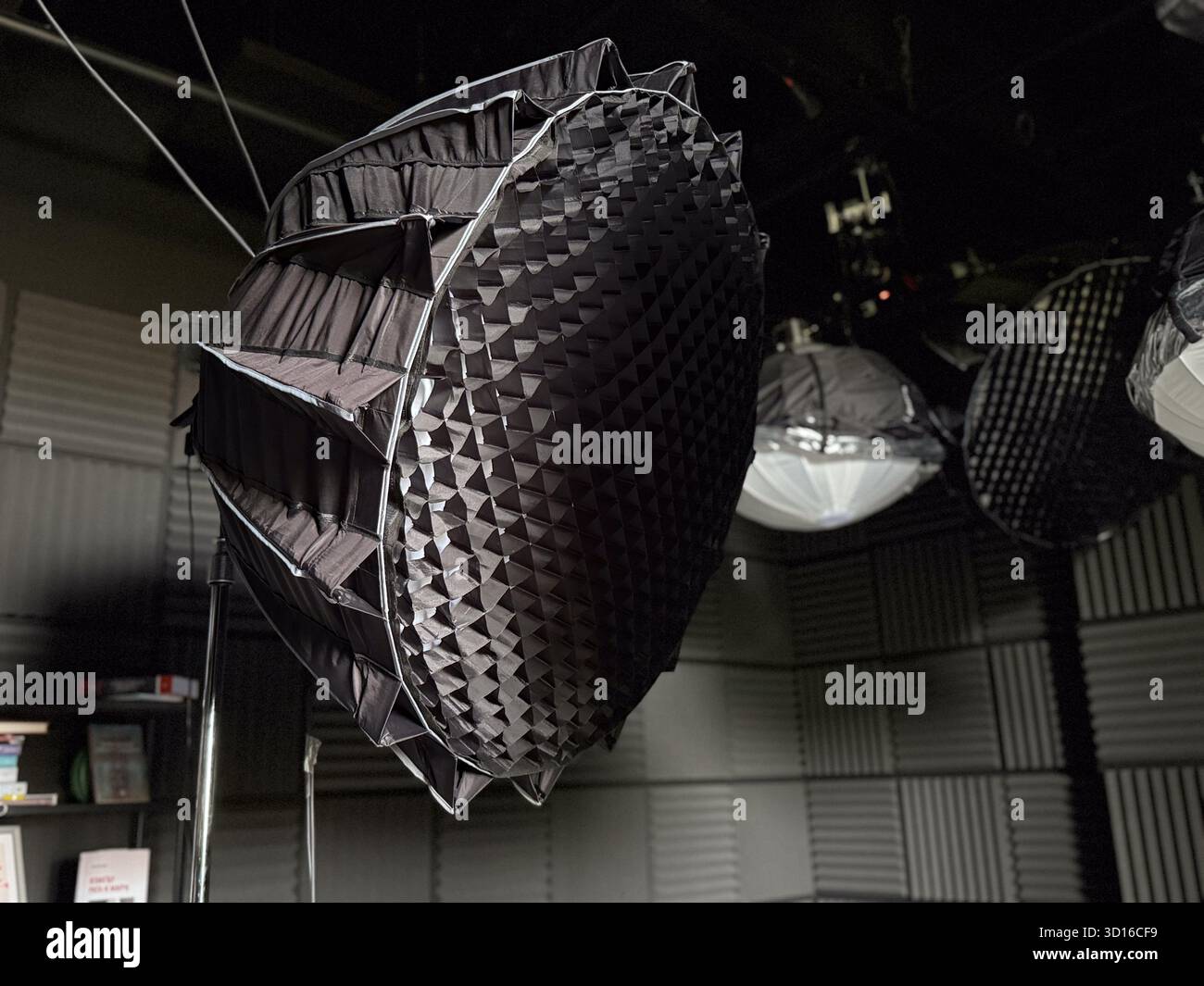 Studio softbox light with grid diffuser in professional setup ...