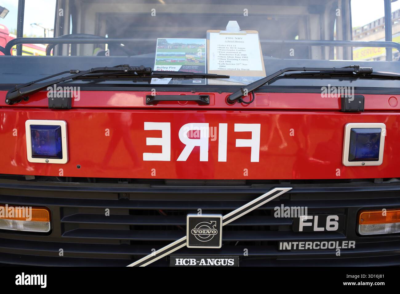 Fire lettering painted in reverse on front of fire engine Stock Photo ...