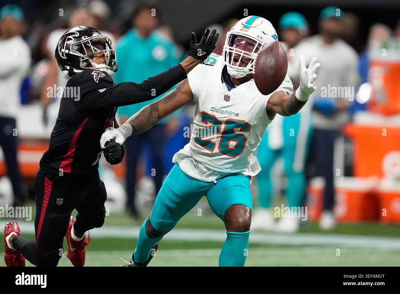 Atlanta Falcons running back Bijan Robinson, left, can't make a catch ...