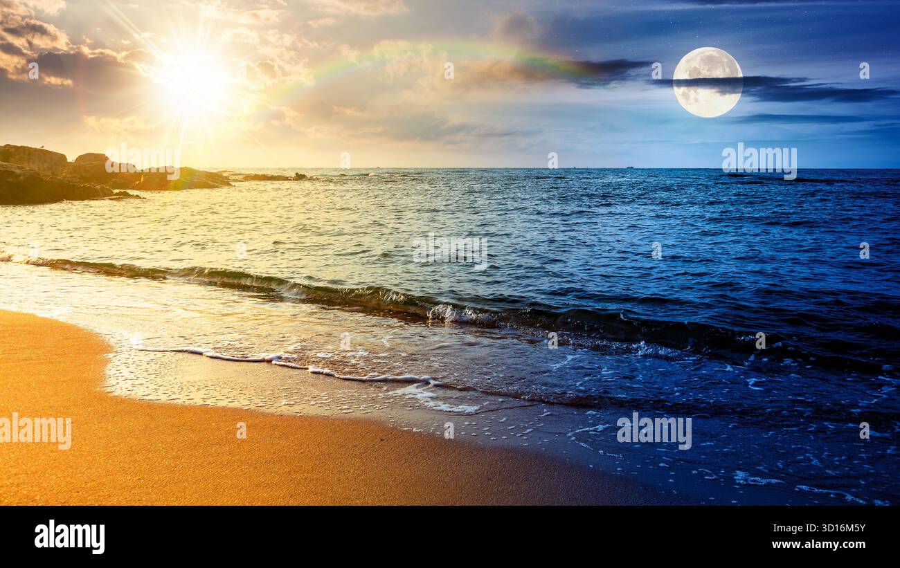 panoramic view of sand beach landscape. day and night time change concept. summer solstice season at the sea with sun and moon on sky. beautiful seasi Stock Photo