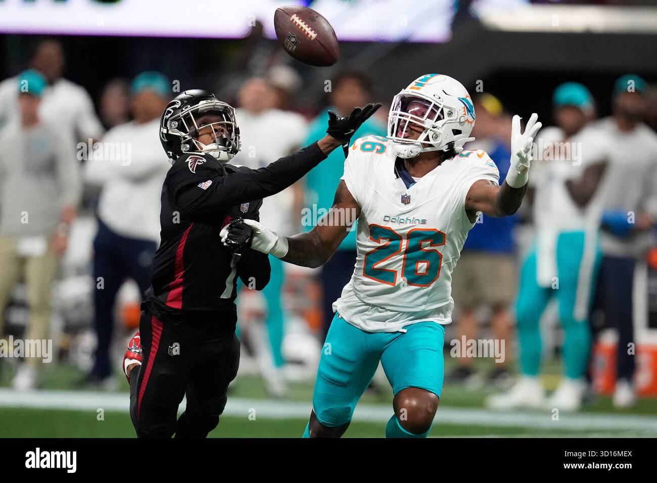 Atlanta Falcons running back Bijan Robinson, left, can't make a catch ...