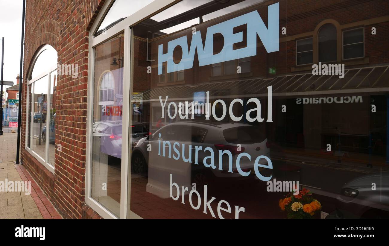 The logos and signage of Howden Insurance in Eastleigh, Hampshire, UK ...
