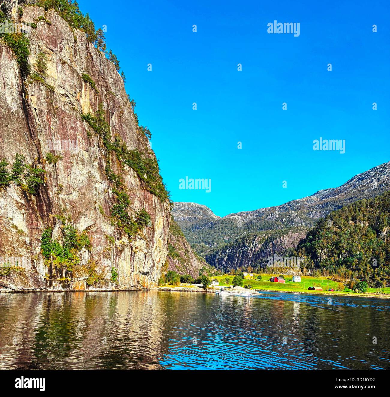 Stunning cliffs and tranquil waters in a Norwegian fjord - Smartphone Captured Stock Image