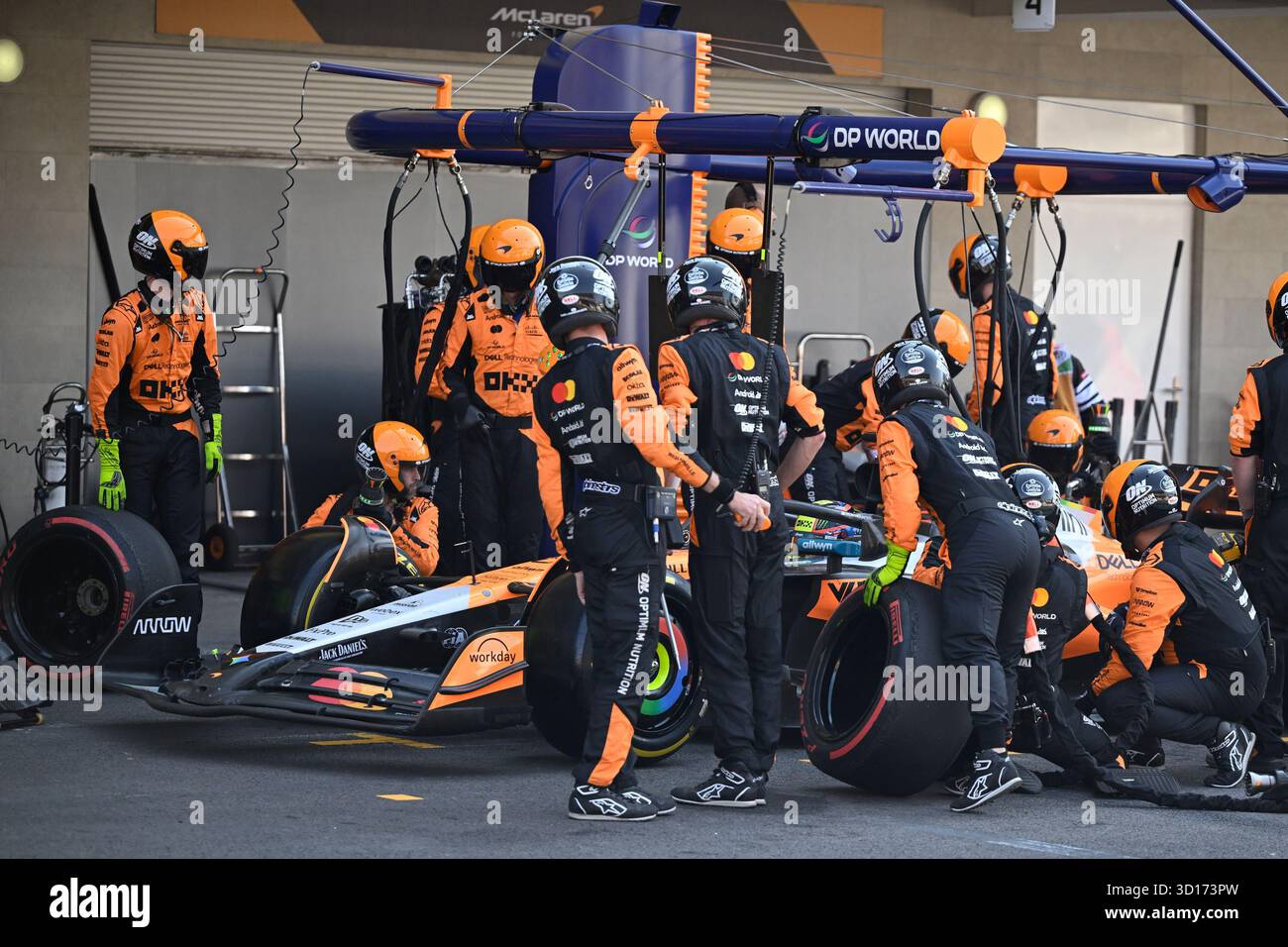 McLaren driver Oscar Piastri of Australia, gets a pit service during ...
