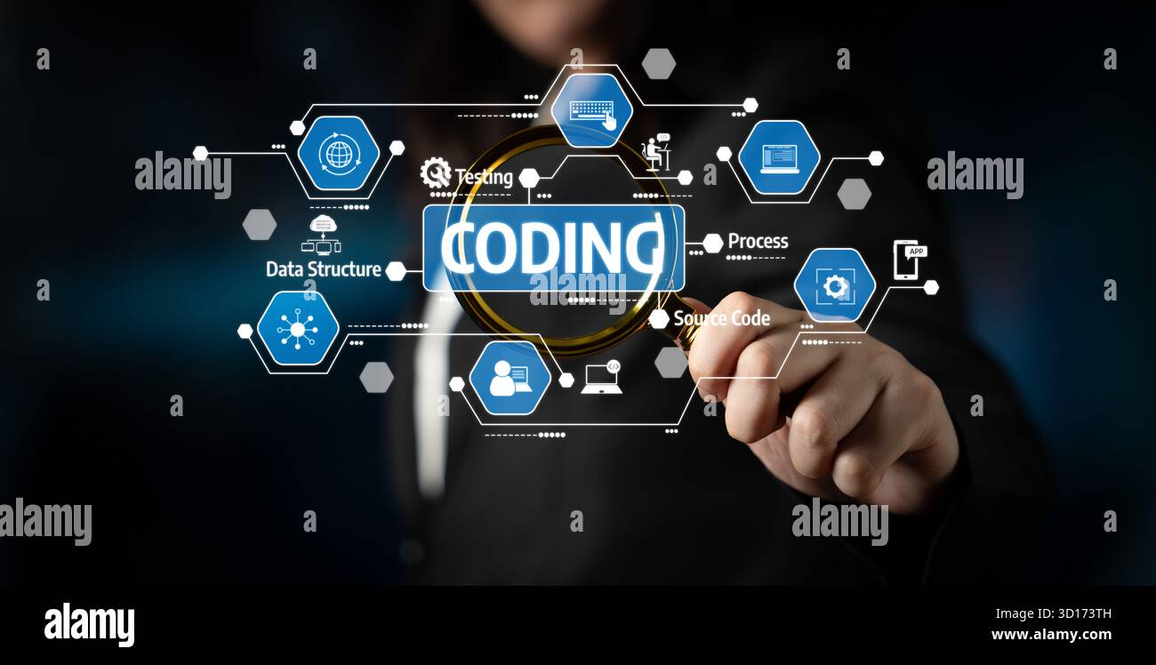 A young programmer interacts with visual representation of coding concepts and data structures in a modern digital workspace, showcasing innovation an Stock Photo