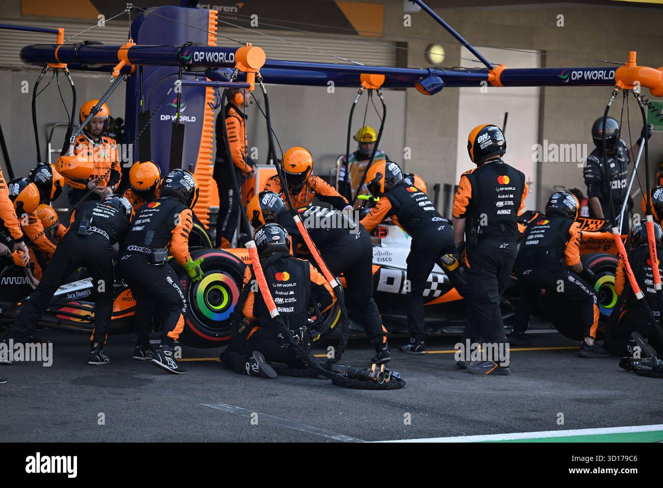 McLaren driver Lando Norris of Britain, gets a pit service during the ...